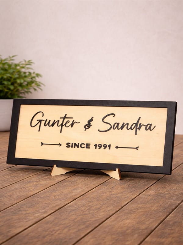 Houten decorbord met de namen Gunter & Sandra en de tekst Since 1991.